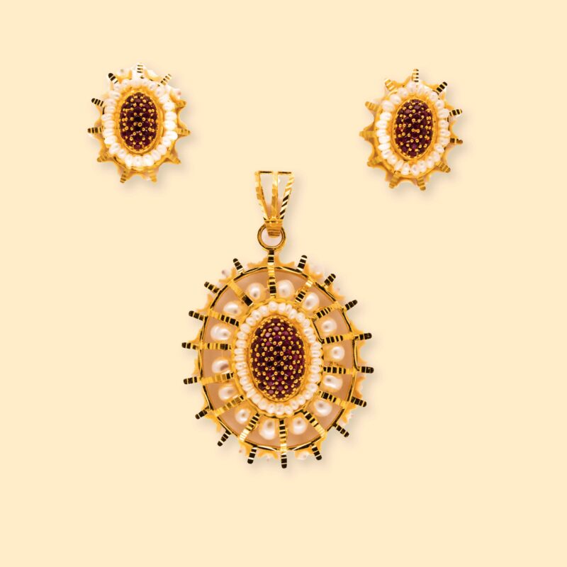 gold earrings and pendant