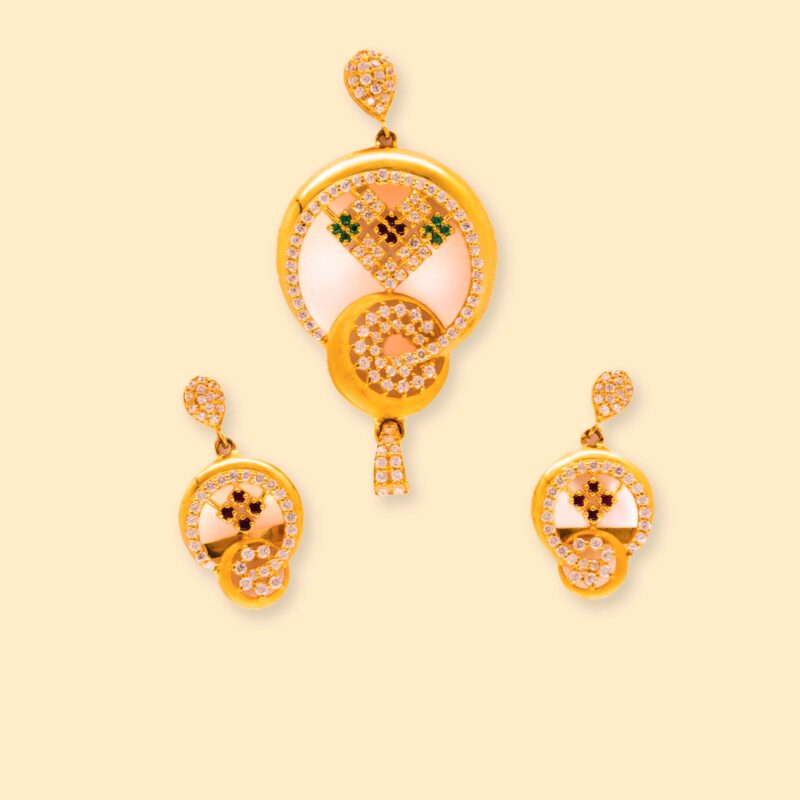 gold and diamond earrings and pendant